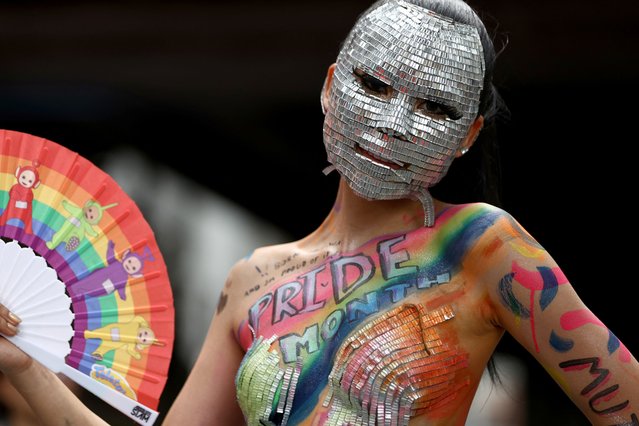 A person takes part in the annual LGBTQ+ Pride parade in Bangkok, Thailand on June 1, 2024. (Photo by Chalinee Thirasupa/Reuters)