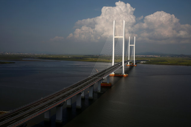 A general view shows the unfinished New Yalu River bridge that was designed to connect China's Dandong New Zone, Liaoning province, and North Korea's Sinuiju, September 11, 2016. (Photo by Thomas Peter/Reuters)