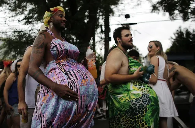 Revellers take part in the annual carnival block party known as “Casas comigo” or “Marry me” at the Vila Madalena neighborhood  in Sao Paulo February 1, 2015. (Photo by Nacho Doce/Reuters)
