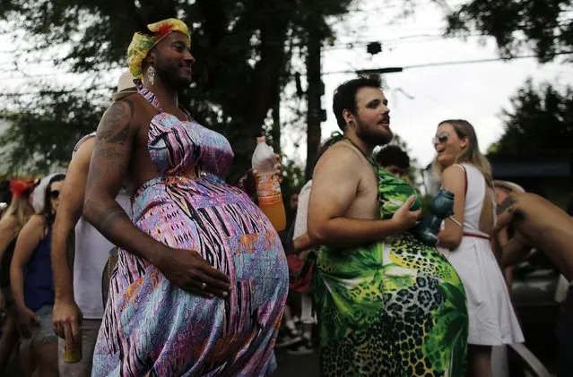 Revellers take part in the annual carnival block party known as “Casas comigo” or “Marry me” at the Vila Madalena neighborhood in Sao Paulo February 1, 2015. (Photo by Nacho Doce/Reuters)