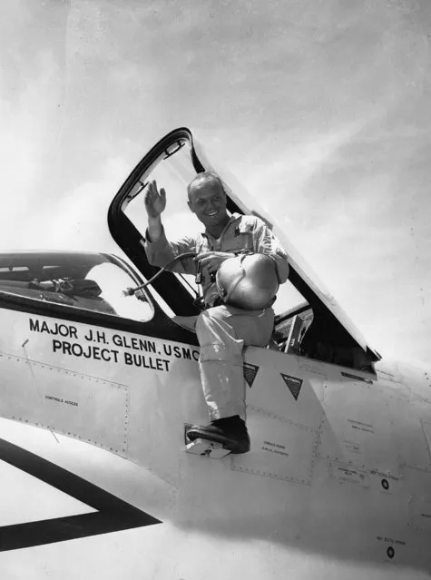Marine pilot Maj. John H. Glenn Jr. prepares to step down from the F8UI Crusader at Floyd Bennet Field on July 16, 1957 after making the first non-stop supersonic flight from Los Angeles to New York. Glenn landed 3 hours, 23 minutes, 8.4 seconds after departure from Los Alamitos Naval air station in Ca., breaking the previous record set in 1955 by an F84F. (Photo by Anthony CameranoAP Photo)