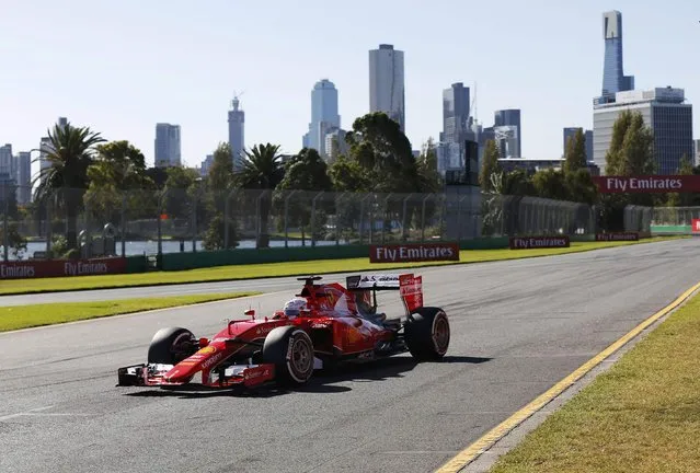 Ferrari Formula One driver Sebastian Vettel of Germany drives during the second practice session of the Australian F1 Grand Prix at the Albert Park circuit in Melbourne March 13, 2015. REUTERS/Jason Reed