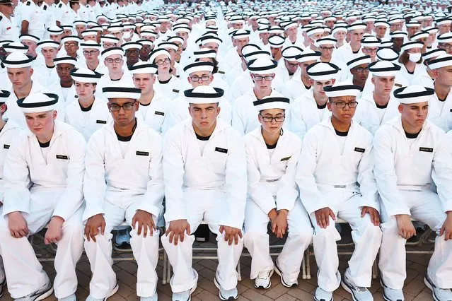Plebes participate in the Oath of Office ceremony at the end of the Induction Day at the U.S. Naval Academy on June 30, 2021 in Annapolis, Maryland. More than 1,100 new midshipmen arrived to take part in the Induction Day (I-Day), the official first day of Plebe Summer. Due to the health and safety concerns associated with the COVID-19 pandemic, the Naval Academy's Class of 2025 arrived over a two-day period. (Photo by Anna Moneymaker/Getty Images)