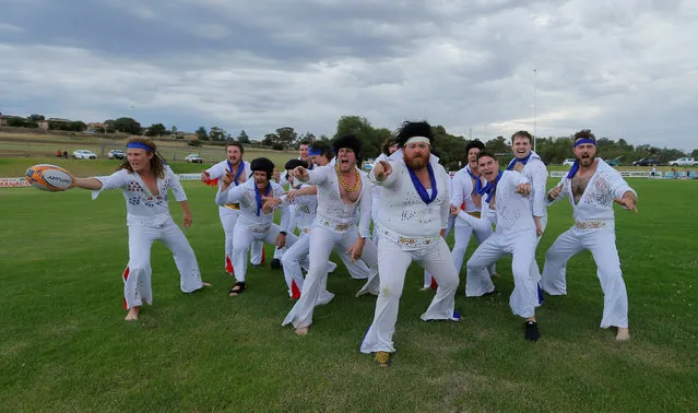 Amateur rugby players from the Blue Suede Shoes team, dressed in Elvis Presley suits, perform a haka prior to their rugby union game against the Reddy Teddies during the 25th annual Parkes Elvis Festival in the rural Australian town of Parkes, west of Sydney, Australia January 13, 2017. (Photo by Jason Reed/Reuters)