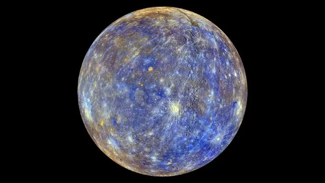An image of the planet Mercury produced by NASA'S MErcury Surface, Space ENvironment, GEochemistry, and Ranging, or MESSENGER probe is seen in an undated picture released April 16, 2015. These colors are not what Mercury would look like to the human eye, but rather the colors enhance the chemical, mineralogical, and physical differences between the rocks that make up Mercury's surface, according to NASA. (Photo by Reuters/NASA/Johns Hopkins University Applied Physics Laboratory/Carnegie Institution of Washington)