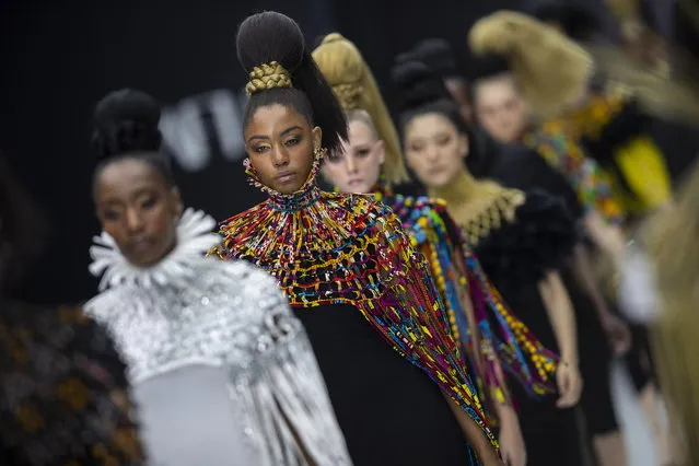 Models present creations by Ghanaian designer Aphia Sakyi during the African Fashion International (AFI) Cape Town Fashion Week, in Cape Town, South Africa, 13 April 2019. The event runs from 11 to 13 April. (Photo by Nic Bothma/EPA/EFE)