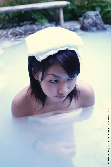 Japanese girl takes a bath
