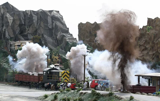 Participants take part in a military show at the opening ceremony of the International Defence Exhibition and Conference (IDEX) in Abu Dhabi, United Arab Emirates February 19, 2017. (Photo by Reuters/Stringer)