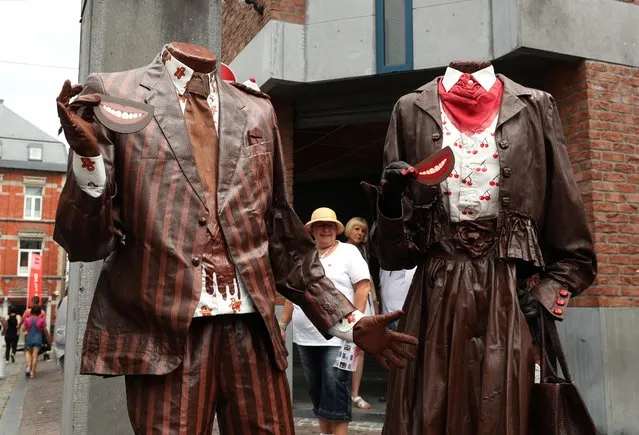 Artist called “Tetes Perdues” takes part in the festival “Statues en Marche” in Marche-en-Famenne, Belgium, July 20, 2019. (Photo by Yves Herman/Reuters)