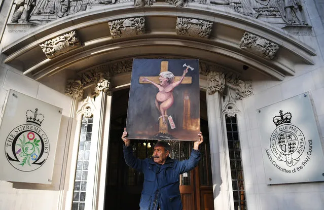 Satircal artist Kaya Mar protests outside at the Supreme Court following a hearing on the prorogation of Parliament, in London, Britain, 19 September 2019. The Supreme Court is due to rule on whether the suspension of parliament by British Prime Minister Boris Johnson was lawful. (Photo by Neil Hall/EPA/EFE)
