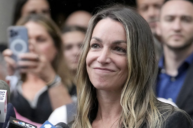 Karen Read smiles during a news conference in front of Norfolk Superior Court, Monday, July 1, 2024, in Dedham, Mass. A judge declared a mistrial Monday after jurors deadlocked in the case of Read, who was accused of killing her Boston police officer boyfriend by striking him with her SUV and leaving him in a snowstorm. (Photo by Steven Senne/AP Photo)