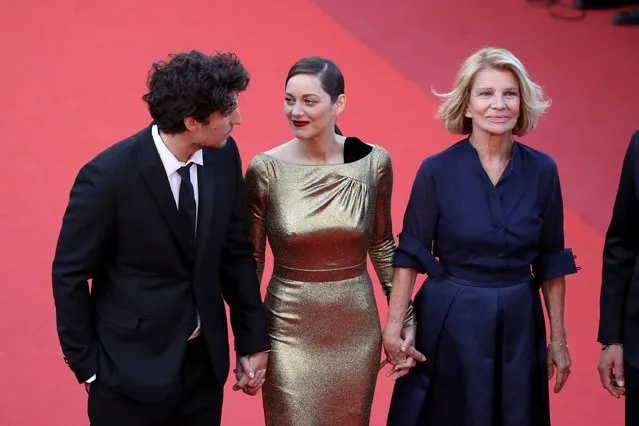 Actor Louis Garrel, actress Marion Cotillard and director Nicole Garcia attend the “From The Land Of The Moon (Mal De Pierres)” premiere during the 69th annual Cannes Film Festival at the Palais des Festivals on May 15, 2016 in Cannes, France. (Photo by Andreas Rentz/Getty Images)