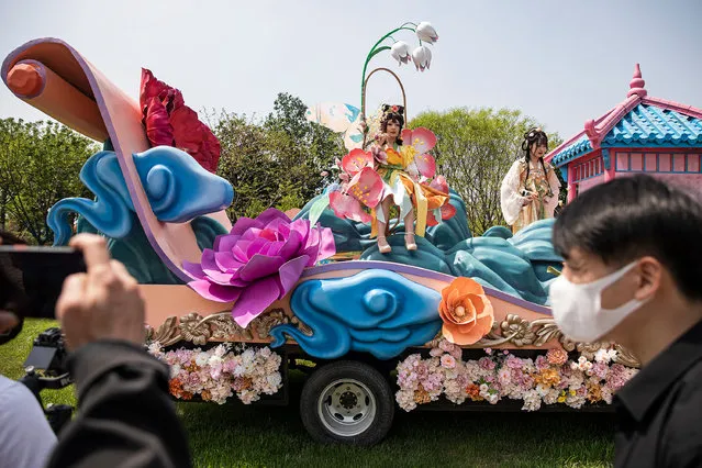 People wearing traditional Chinese costumes participate in Qingming Festival celebrations on April 2, 2022 in Wuhan, Hubei province, China. The Qingming festival or Tomb-Sweeping Day, held on April 5 this year, is an annual Chinese ethnic ritual to remember, honour, and pilgrimage to ancestors' graves, and is celebrated across ethnic Chinese communities. (Photo by Getty Images)