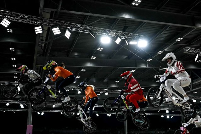 (From L) US' #11 Alise Willoughby, Netherlands' #22 Merel Smulders, Netherlands' #61 Manon Veenstra, Denmark's #175 Malene Kejlstrup and Latvia's #218 Veronika Monika Sturiska compete in the third heat of the third run of the Women's Cycling BMX Racing quarterfinals during the Paris 2024 Olympic Games in Saint-Quentin-en-Yvelines, on August 1, 2024. (Photo by Mauro Pimentel/AFP Photo)