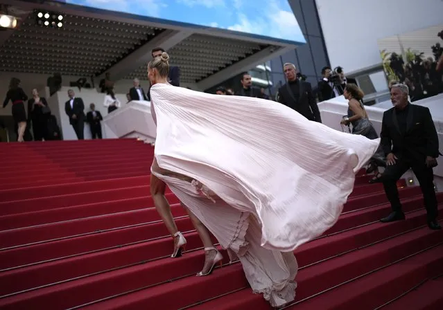 Russian supermodel Natasha Poly poses for photographers upon arrival at the 75th anniversary celebration of the Cannes film festival and the premiere of the film “The Innocent” at the 75th international film festival, Cannes, southern France, Tuesday, May 24, 2022. (Photo by Daniel Cole/AP Photo)