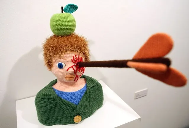 The knitted sculpture 'William Tell' by Patricia Waller sits in the 'Broken Heroes' exhibition at the Deschler Gallery