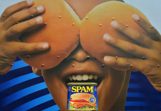 A can of Spam meat made by the Hormel Foods Corporation is pictured outside a store in front of a delivery truck in Silver Spring, Maryland, on July 5, 2012