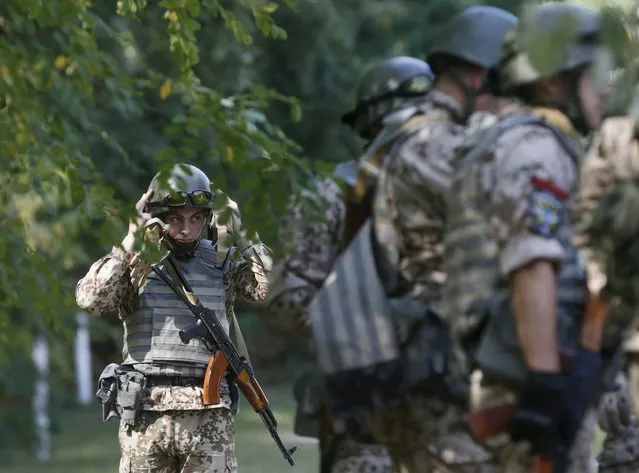 Members of the Ukrainian Interior Ministry's special battalion Kiev-1 take part in an anti-terror drill in Kiev, Ukraine, August 28, 2015. (Photo by Valentyn Ogirenko/Reuters)