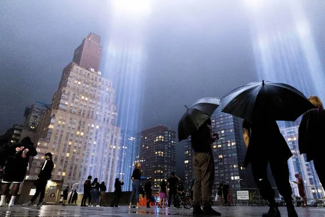 The annual Tribute in Light is illuminated above Lower Manhattan on the 21st anniversary of 9/11 on Sunday, September 11, 2022, in New York. (Photo by Julia Nikhinson/AP Photo)