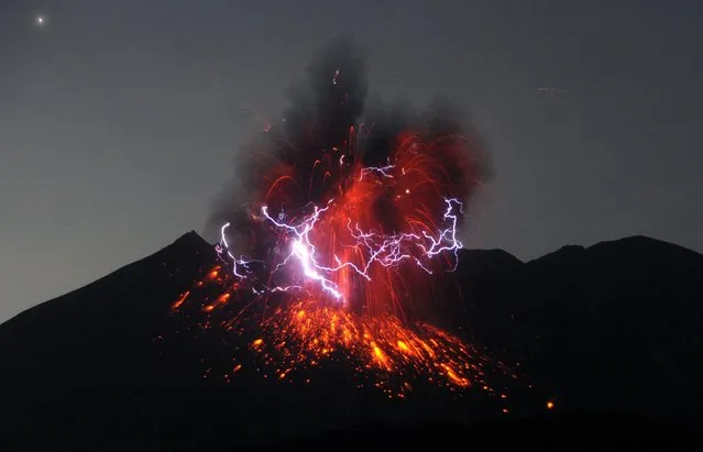 A dirty thunderstorm occurs over Mount Sakurajima as the volcano erupts violently at 12:02 am on July 26, 2016 in Tarumizu, Kagoshima, Japan. (Photo by The Asahi Shimbun via Getty Images)