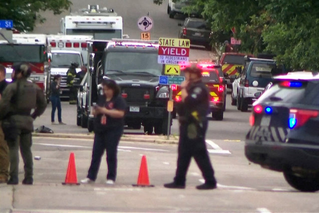Police work at the scene after an attack that injured multiple people in Boulder, Colorado, U.S. June 1, 2025 in a still image from video. (Photo by ABC AFFILIATE KMGH via Reuters)