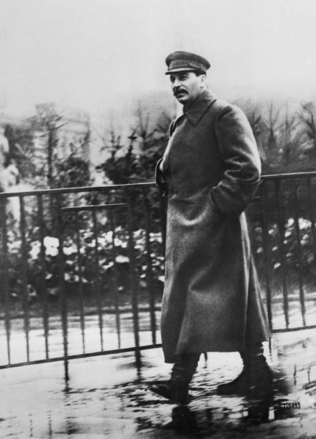 Josef Stalin, leader of the Soviet Union, is shown as he enjoys a walk in historic Red Square in Moscow, May 14, 1932. (Photo by AP Photo)