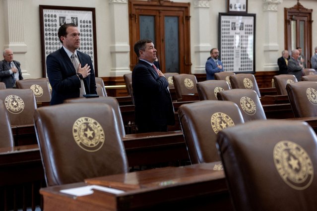 Surrounded by empty seats, Texas lawmakers say the pledge as the House is called to order, after Democratic lawmakers in Texas left the state to deny Republicans the quorum needed to redraw the state's 38 congressional districts, at the Texas State Capitol in Austin, Texas on August 4, 2025. The session was adjourned due to the lack of quorum. (Photo by Nuri Vallbona/Reuters)