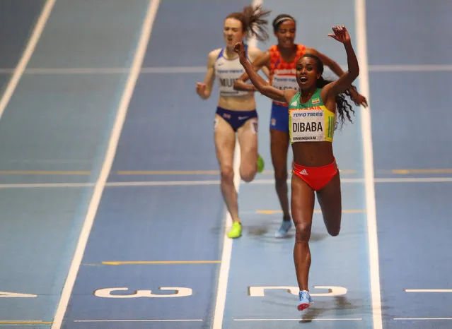 Ethiopia' s Genzebe Dibaba (R) finishes ahead of Netherlands' Sifan Hassan (C) and Britain' s Laura Muir (L) to win the women' s 3000 m final at the 2018 IAAF World Indoor Athletics Championships at the Arena in Birmingham on March 1, 2018. (Photo by Hannah McKay/Reuters)