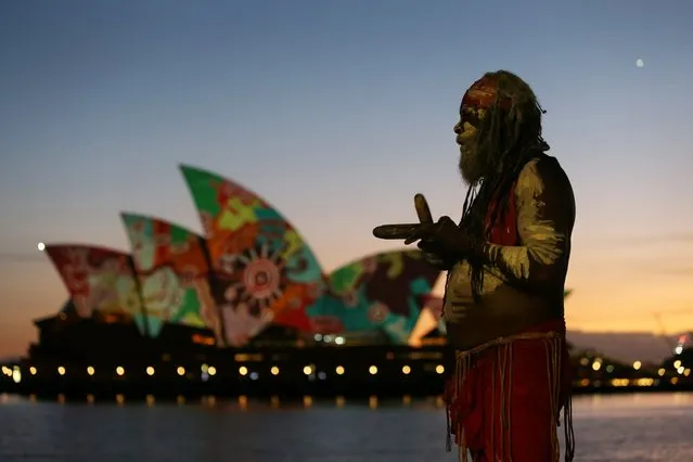 First Nations projections by Pitjantjara Artist David Miller appear on the sails of the Sydney Opera House on January 26, 2022 in Sydney, Australia. The artwork tells the story of the song line of the Wati Ngintaka (the giant perentie lizard man) as he searches for a special grindstone, creating waterholes and food sources in his travels. Australia Day, formerly known as Foundation Day, is the official national day of Australia and is celebrated annually on January 26 to commemorate the arrival of the First Fleet to Sydney in 1788. Indigenous Australians refer to the day as 'Invasion Day' and there is growing support to change the date to one which can be celebrated by all Australians. (Photo by Lisa Maree Williams/Getty Images)