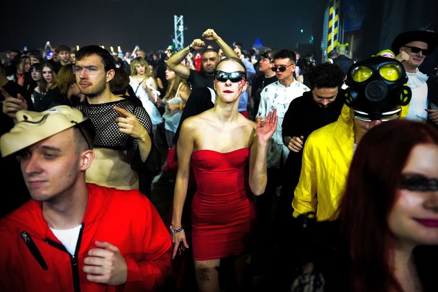 People attend a Halloween rave in Kyiv, Ukraine, Saturday, October 25, 2025. (Photo by Julia Demaree Nikhinson/AP Photo)