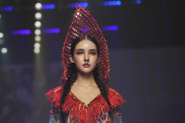 A model presents a creation as part of the Issue show, during Paragon Bangkok International Fashion Week in Thailand, Friday, October 4, 2024. (Phoot by Sakchai Lalit/AP Photo)