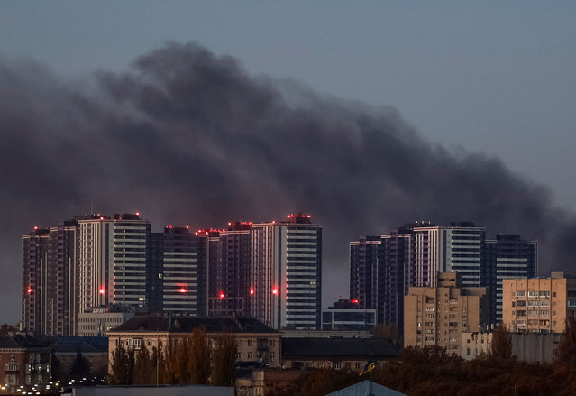 Smoke rises in the sky over the city after a Russian drone strike, amid Russia's attack on Ukraine, in Kyiv, Ukraine on November 7, 2024. (Photo by Gleb Garanich/Reuters)