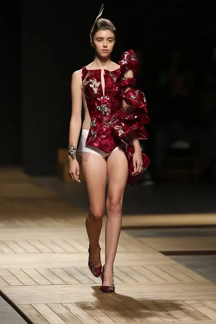 A model presents a creation by London-based Portuguese designer Olga Noronha during the 51st Lisbon Fashion Week, in Lisbon, Portugal, 14 October 2018. (Photo by Jose Sena Goulao/EPA/EFE)