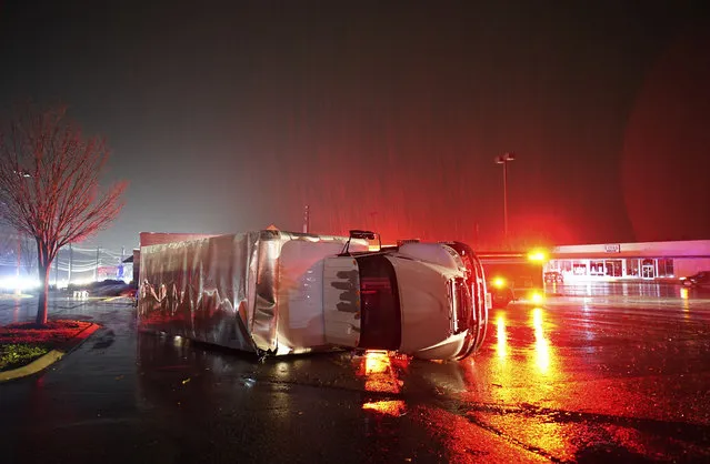 A semitrailer is overturned by an apparent tornado on West Main Street in Hendersonville, Tenn., Saturday, December 9, 2023. (Photo by Andrew Nelles/The Tennessean via AP Photo)