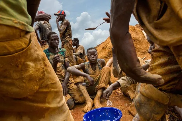 The laptops, cameras, gaming systems, and other electronic gear that consumers eagerly buy often come with a hidden, painful cost. Many of these items, as well as pieces of high-price jewelry, contain minerals – gold, diamonds, tin, copper, and tantalum, among others – that have been illegally dug out from mines in the Democratic Republic of the Congo. Government officials, soldiers, and militia warlords fight over the spoils, killing thousands of people each year, most of them civilians. (Photo by Marcus Bleasdale/National Geographic)