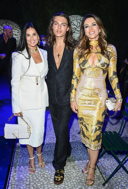 American actress Demi Moore, English model, son of actress Elizabeth Hurley and American businessman Steve Bing Damian Charles Hurley and English actress Elizabeth Hurley are seen on the front row of the Versace special event during the Milan Fashion Week – Spring / Summer 2022 on September 26, 2021 in Milan, Italy. (Photo by Daniele Venturelli/Getty Images)