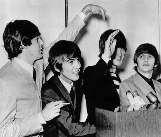 A press conference for the Beatles at the Hilton Hotel, in San Francisco, on August 19, 1964, brightened when they were asked which of the foursome was married. John Lennon second from right, owned up and was pointed out by Paul McCartney, left. Second from left is George Harrison, and at right, is Ringo Starr. Their Cow Palace appearance had been sold out for months. (Photo by AP Photo)