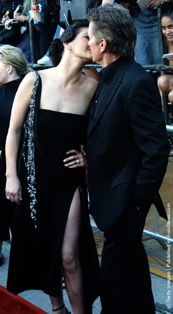 Catherine Zeta Jones kisses her husband, actor Michael Douglas