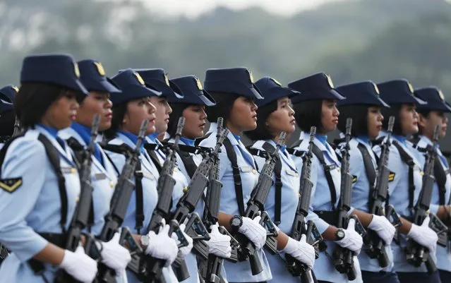Members of the Indonesian Air Force parade during celebrations marking the 70th anniversary of the Air Force at Halim Perdanakusuma air base in Jakarta, Indonesia, April 9, 2016. (Photo by Reuters/Beawiharta)