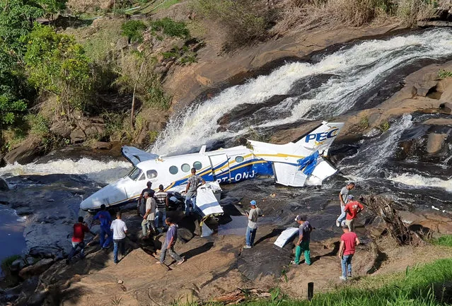 This handout photo released by Minas Gerais Military Firefighters Corps shows the airplane plane that crashed that was transporting Brazilian singer Marilia Mendonca, in the southeastern Brazilian of state Minas Gerais, Friday, November 5, 2021. One of Brazil's most popular singers and a Latin Grammy winner, Mendonca died on Friday, Nov. 5, 2021, in an airplane crash on her way to a concert. Mendonça was 26 and performed country music in Brazil called sertanejo. (Photo by Minas Gerais Military Firefighters Corps via AP Photo)