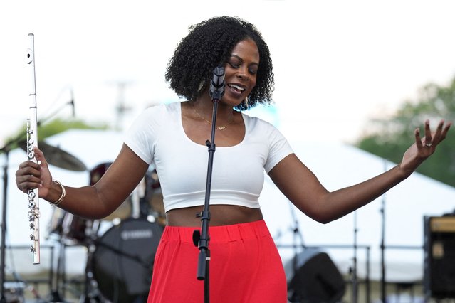 Ashley Michelle performs with Brassville at an event to mark Juneteenth in Nashville, Tennessee on June 19, 2024. (Photo by Kevin Wurm/Reuters)