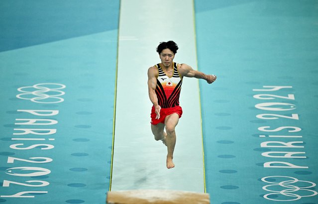 Japan's Shinnosuke Oka competes in the vault event of the artistic gymnastics men's all-around final during the Paris 2024 Olympic Games at the Bercy Arena in Paris, on July 31, 2024. (Photo by Lionel Bonaventure/AFP Photo)