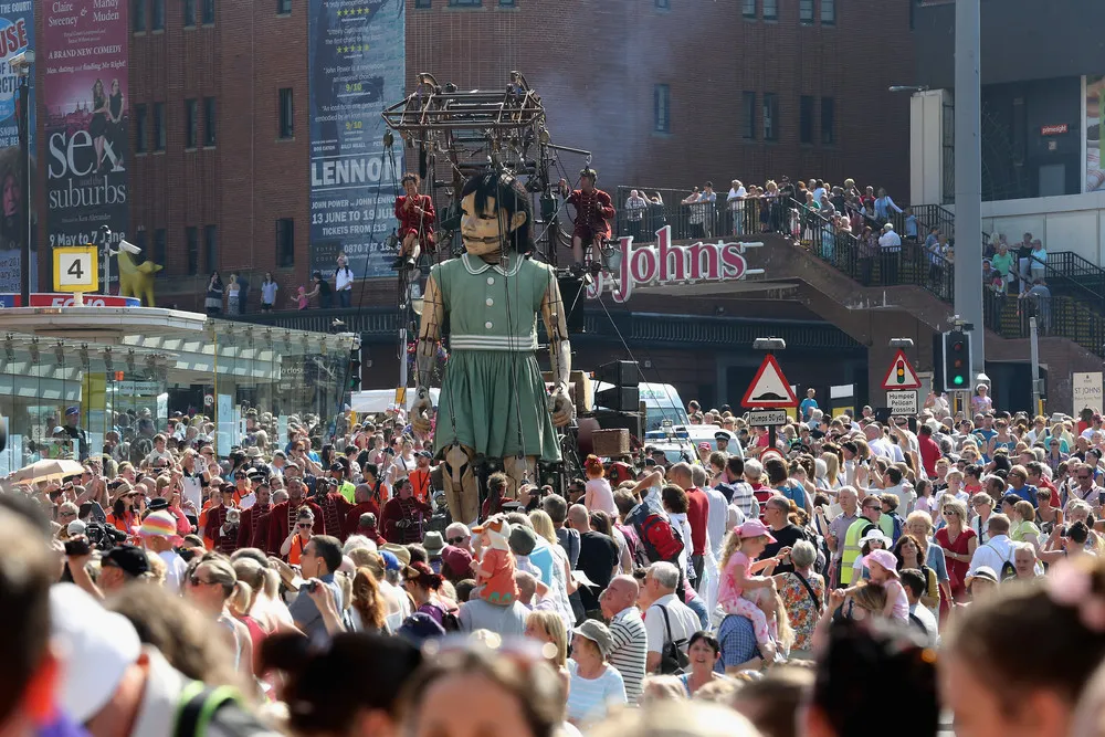 Little Giant Girl Marches through Liverpool
