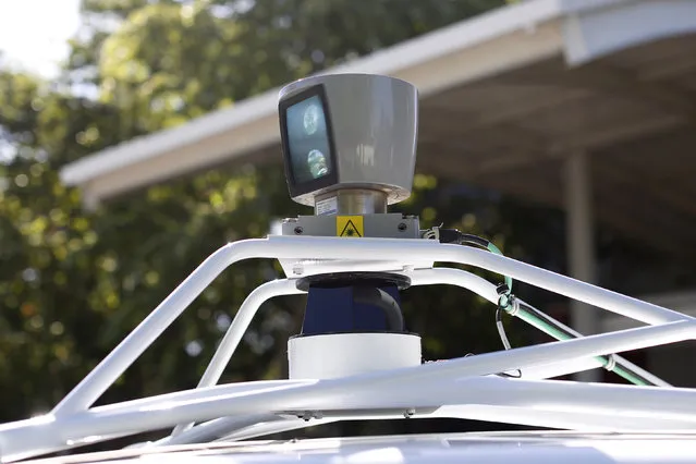 A sensor is seen spinning atop a Google self-driving vehicle before a presentation at the Computer History Museum in Mountain View, California, 2014. (Photo by Stephen Lam/Reuters)