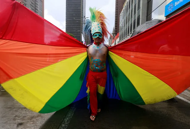 A reveller attends an annual gay pride parade in Bogota, Colombia, July 3, 2016. (Photo by John Vizcaino/Reuters)