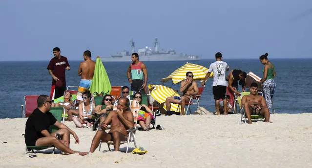 Navy vessels patrol the coast off of the famed Copacabana  beach on August 2, 2016 in Rio De Janeiro, Brazil. (Photo by Jonathan Newton/The Washington Post)
