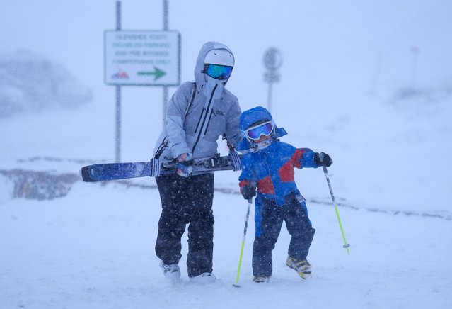 People at Glenshee Ski Centre on Tuesday, January 7, 2025. Weather warnings for snow and ice are in force across much of the UK after severe flooding and snow caused travel disruption and school closures. Across England, there are also 198 flood warnings, meaning flooding is expected, and 300 flood alerts, meaning flooding is possible. (Photo by Andrew Milligan/PA Images via Getty Images)
