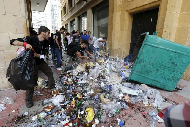 Protesters, calling on minister Mohamad Al Machnouk to resign over a rubbish disposal crisis, leave garbage at one of the entrances to the environment ministry in downtown Beirut, Lebanon September 15, 2015. (Photo by Mohamed Azakir/Reuters)