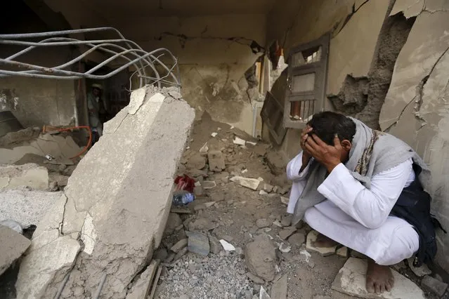 A man who lost his relatives in a Saudi-led air strike cries at the site of the air strike in Yemen's capital Sanaa September 21, 2015. (Photo by Khaled Abdullah/Reuters)