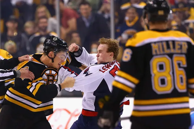 Tyler Lewington #78 of the Washington Capitals and Justin Hickman #60 of the Boston Bruins fight during the second period at TD Garden on September 22, 2015 in Boston, Massachusetts. (Photo by Maddie Meyer/Getty Images)